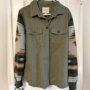 Thread & Supply green utility jacket with Aztec sweater sleeves.